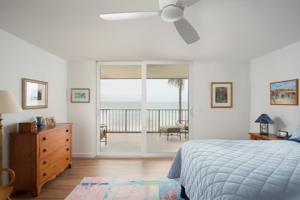 Luxurious master bedroom renovation with coastal design elements in Key West condo