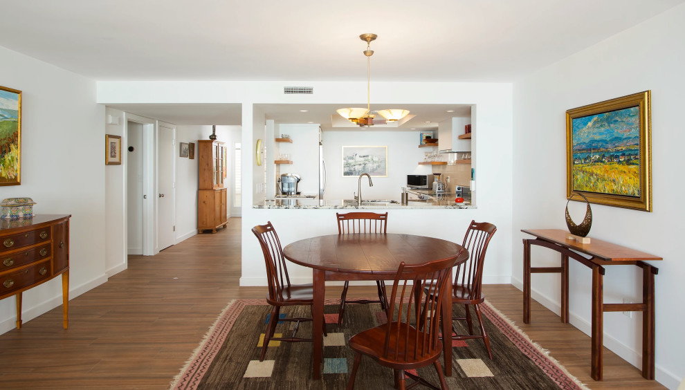 Modern dining room renovation in Key West beach condo with custom finishes