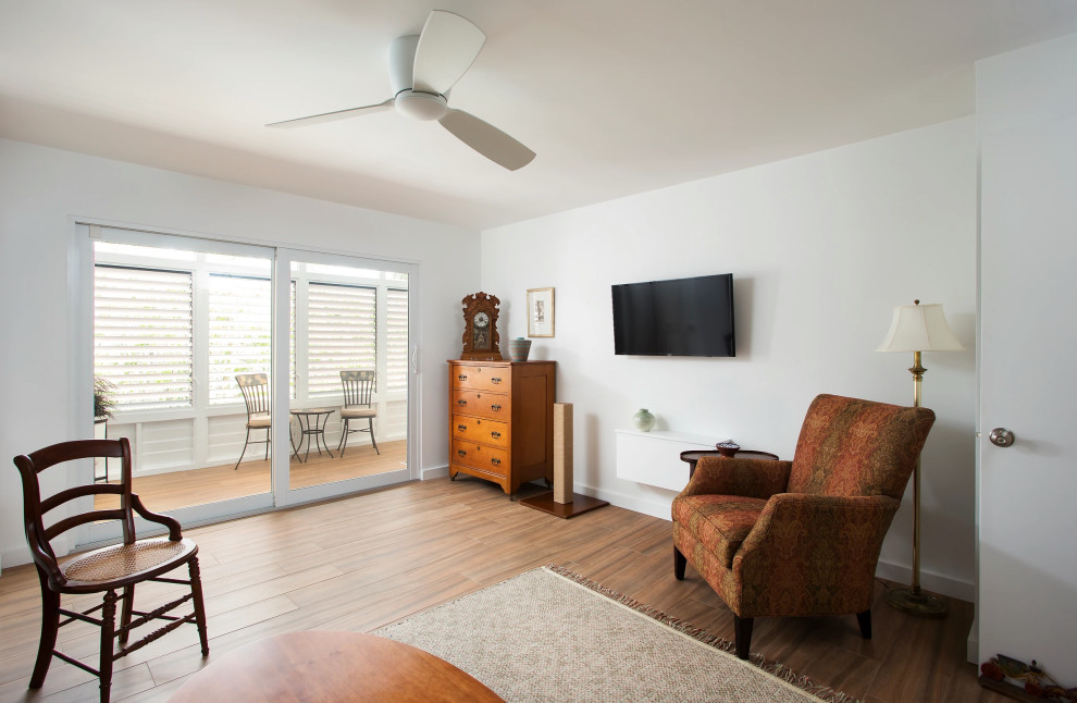 Spacious living room renovation with custom details in Key West beach condo