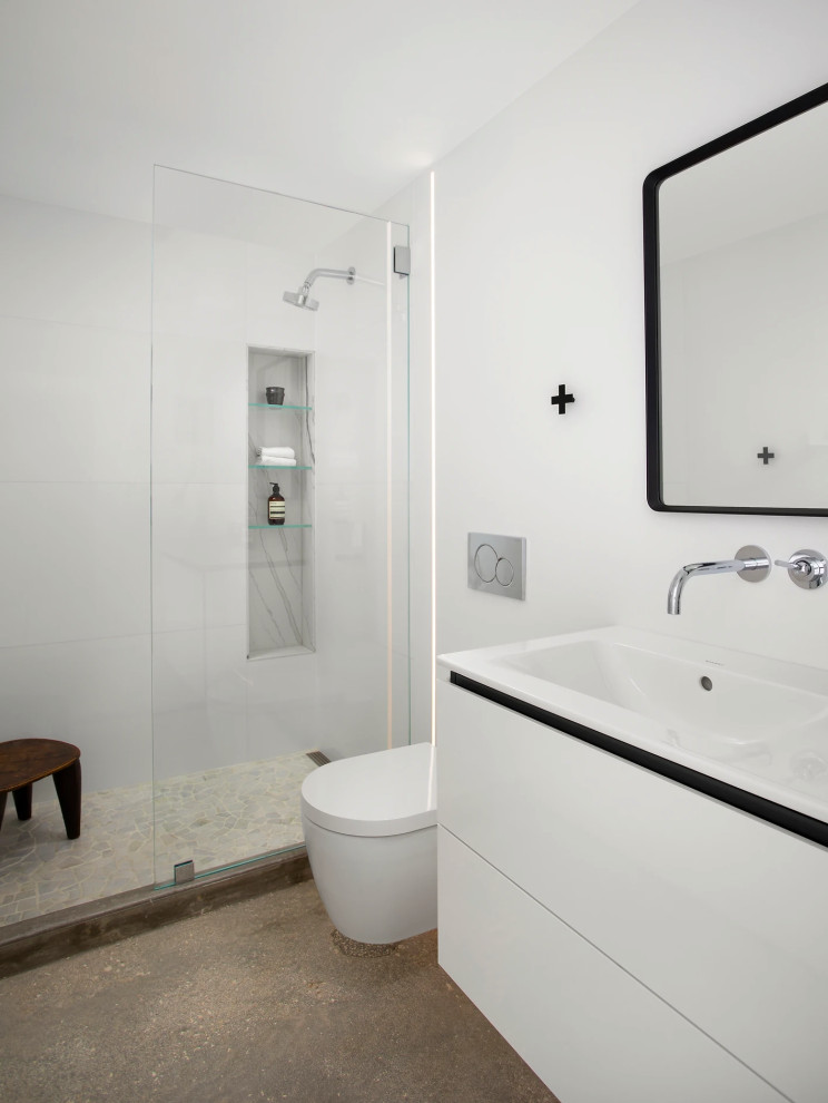 Luxurious modern bathroom with freestanding tub and custom tilework in Key West residence