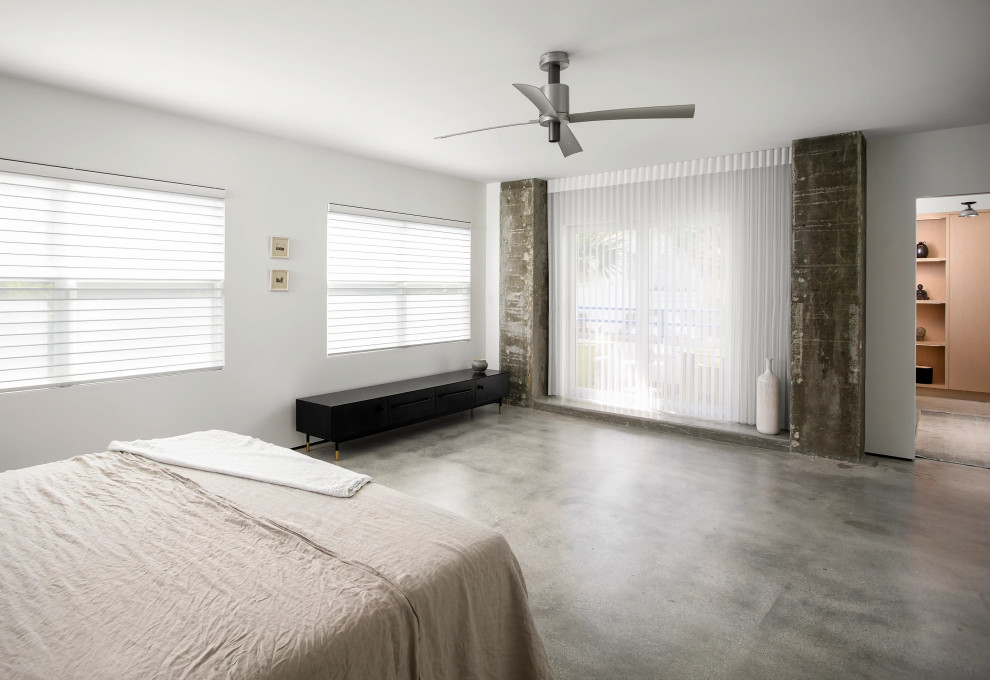 Contemporary guest bedroom with coastal touches in newly constructed Key West home