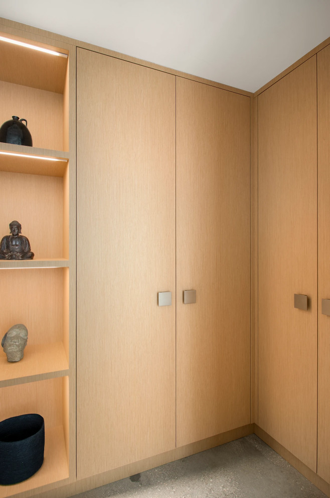 Modern en-suite bedroom with custom built-ins and designer details in Key West residence