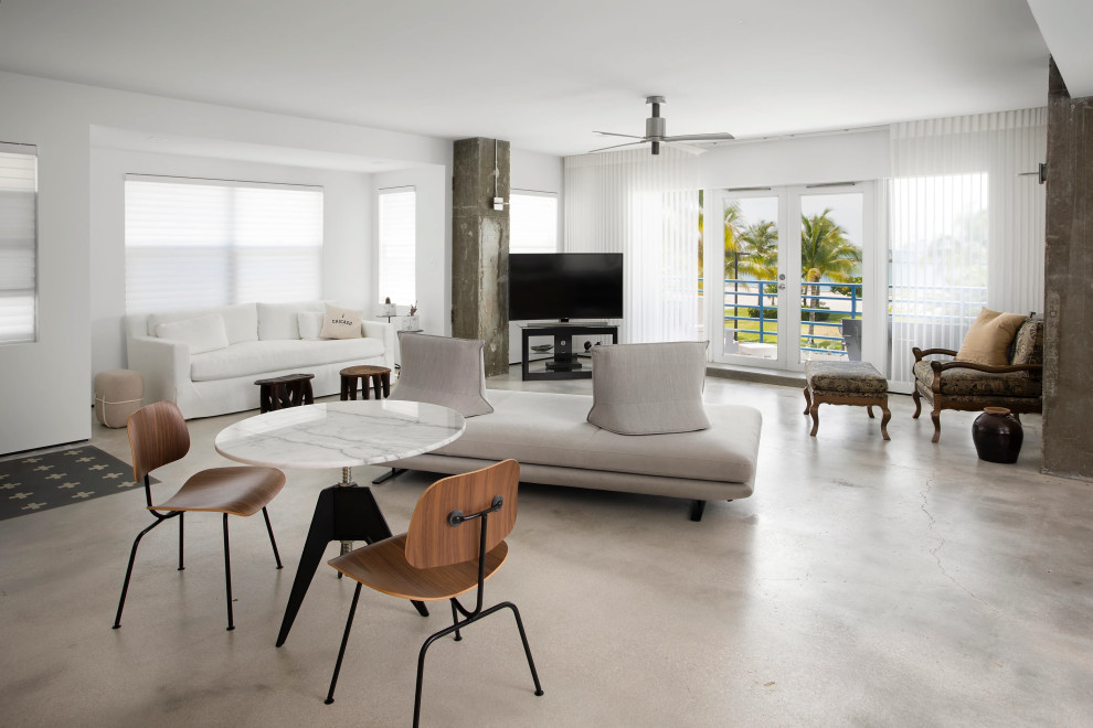 Contemporary living room with designer furnishings and ocean views in Key West luxury residence