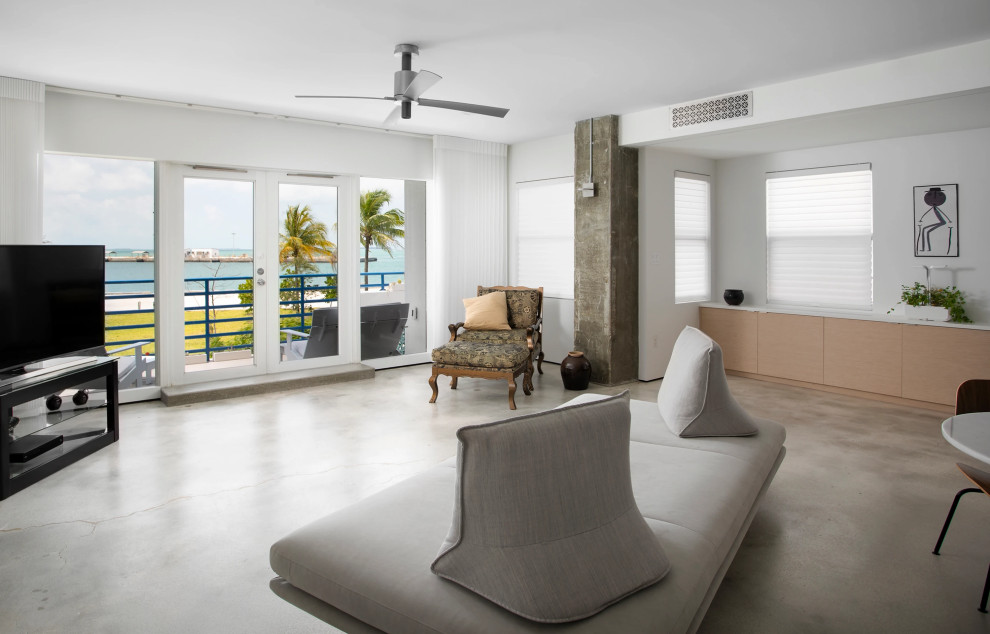 Modern living room with ocean views and sectional sofa in Key West luxury residence