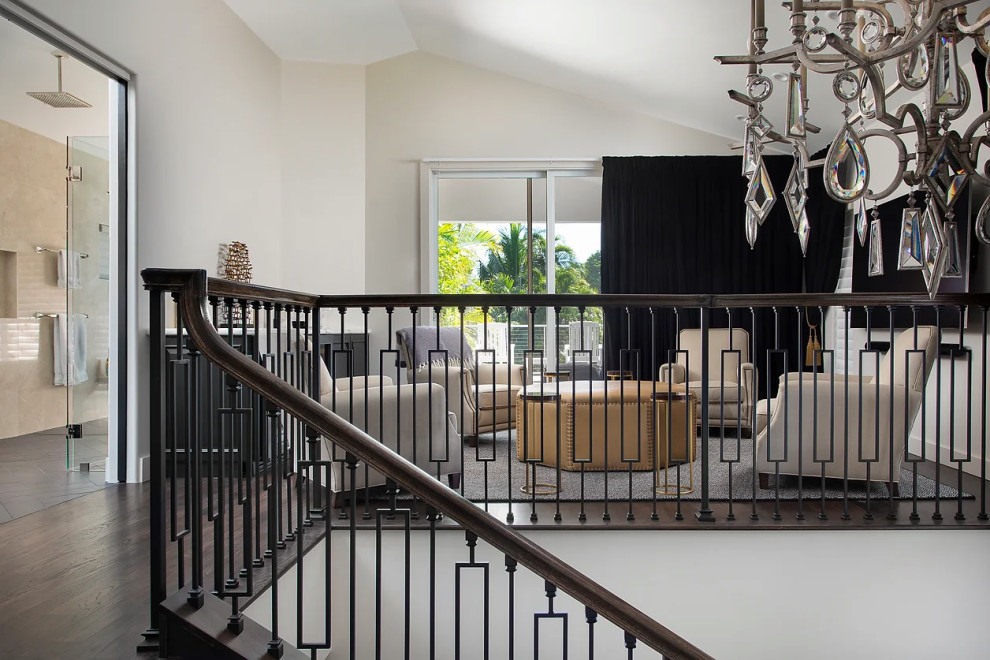 Contemporary living room with architectural railings and natural light in Key West renovation