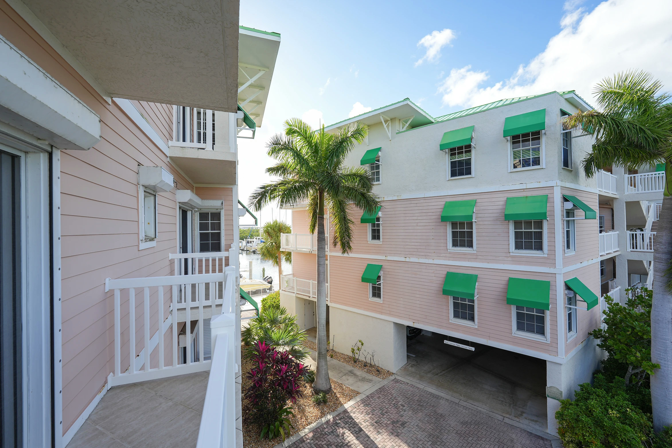 Open concept living room with panoramic marina views at Sunset Marina in Key West