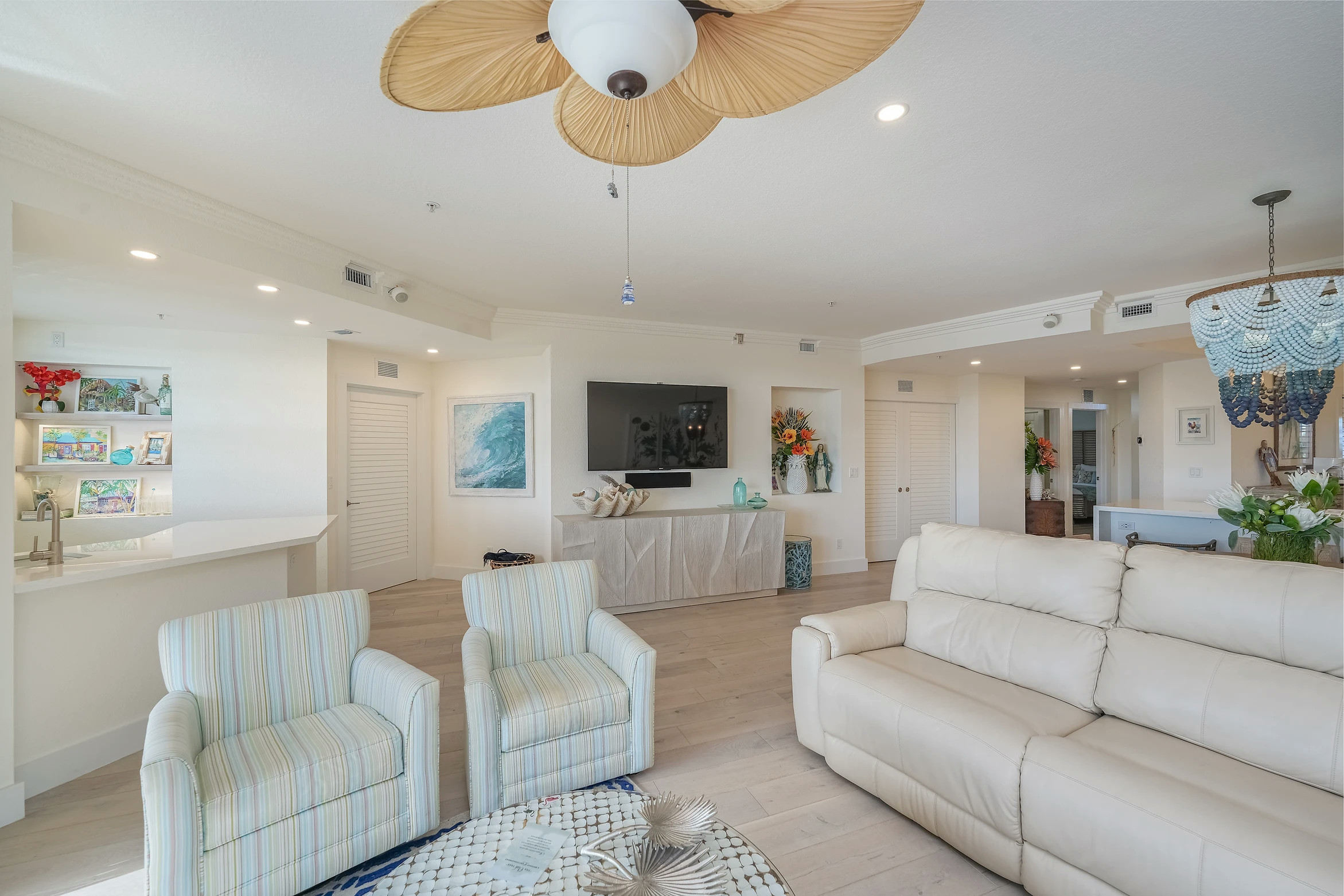 Luxury living room with marina views and designer furnishings at Sunset Marina