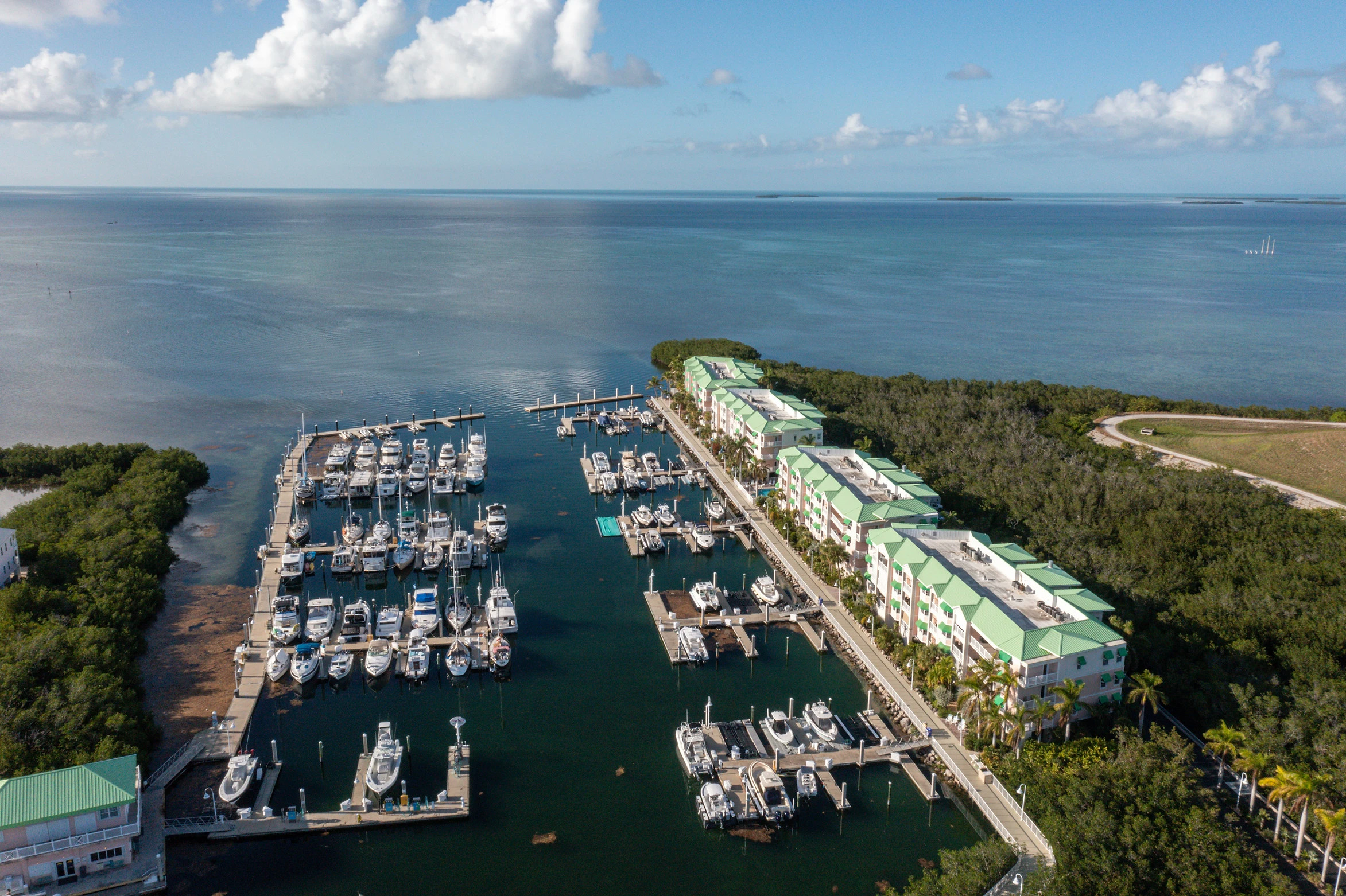 Elegant living room with blue accents and marina views at Sunset Marina in Key West